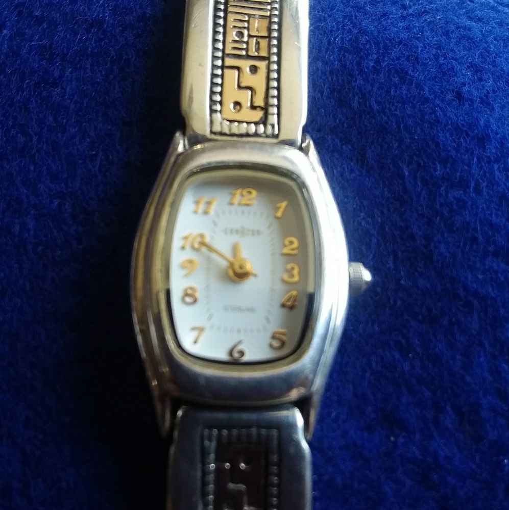 (Roderick Tenorio) silver &14k gold , signed watch